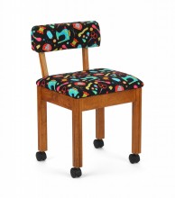 he Arrow Oak and Black Sewing Chair is a popular model, and it appears you're looking for the version with an oak frame and black sewing notions upholstery.
